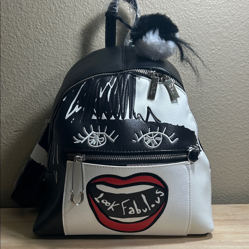 Stylish Black and White Backpack with Graphic Design